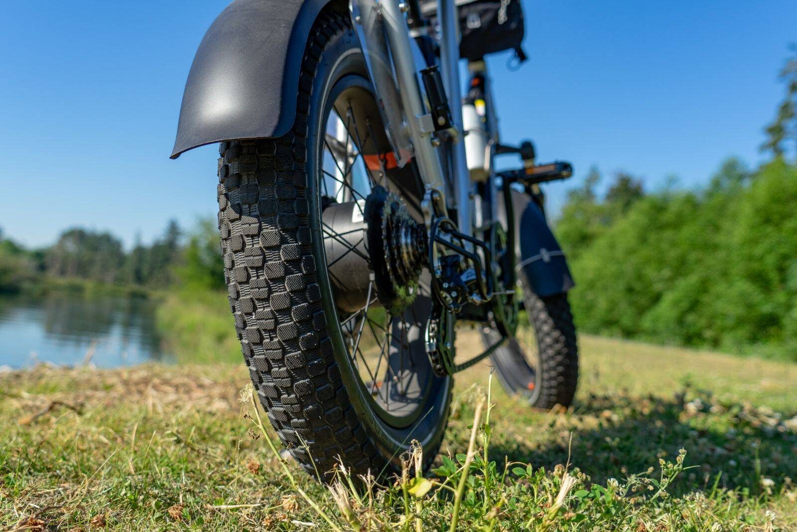 Close up of wheels of chunky e-bike.