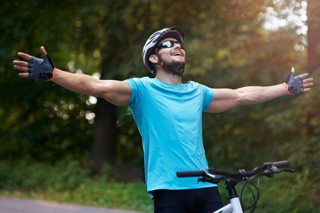 A cheerful and happy cyclist