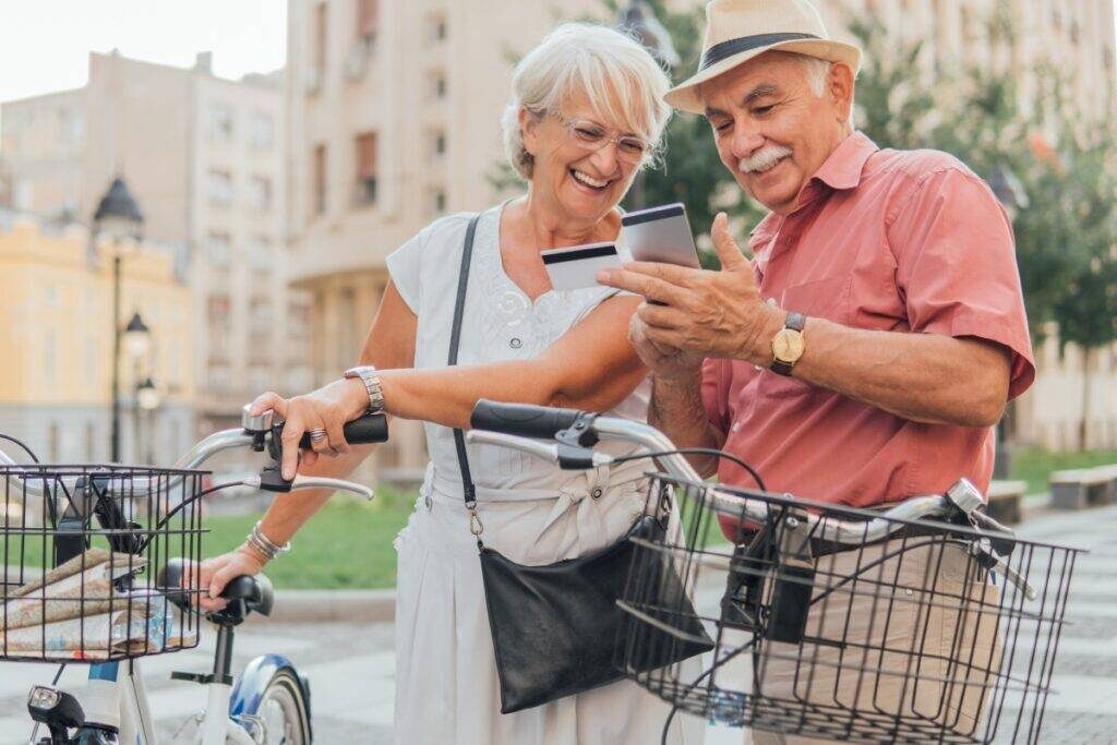 Mature man and woman on bicycles