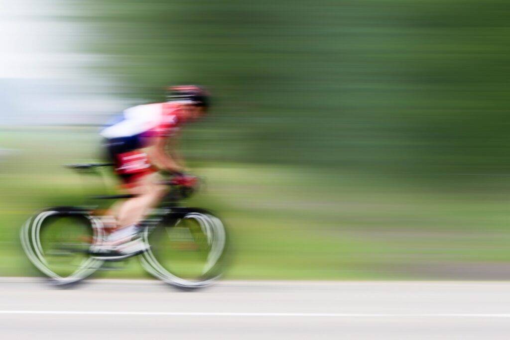 female cyclist fast