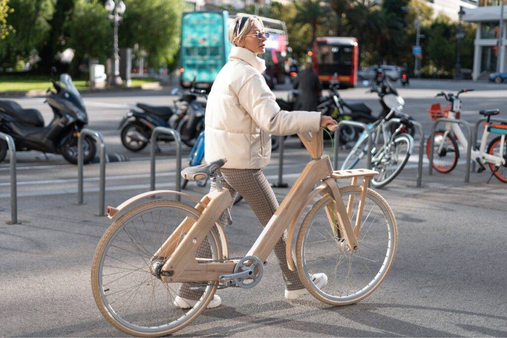 female cyclist with bicycle